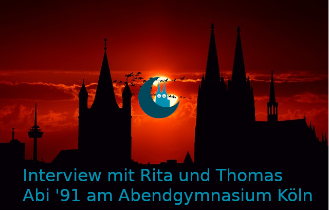 Interview mit Rita und Thomas - Logo vor dem abendlichen Köln